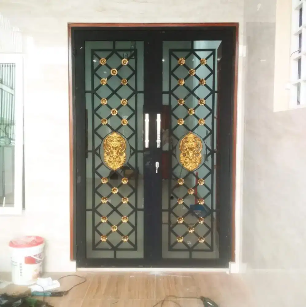 Trsalis, pintu besi, garasi mobil, kanopi,ralling tangga dll