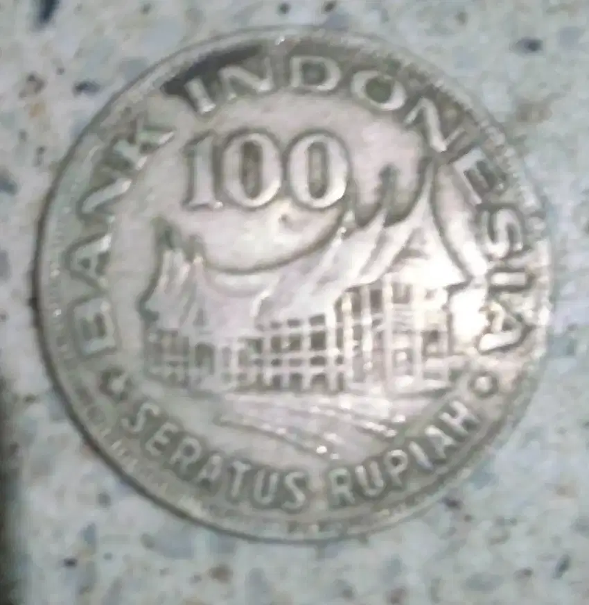 Uang koin kuna senilai Rp. 100,-.