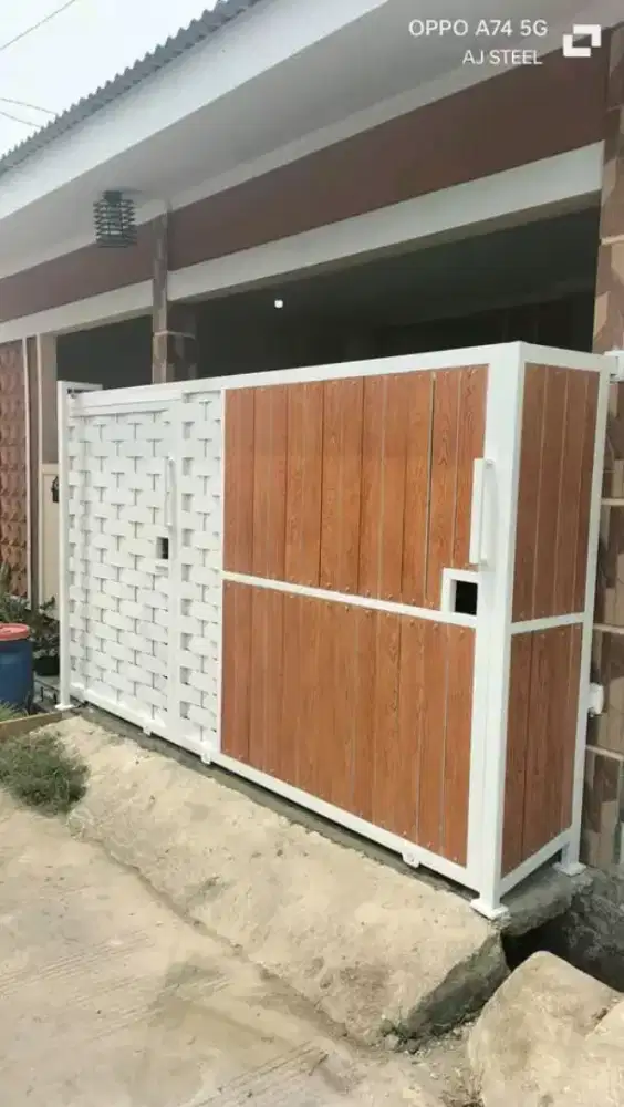 Pagar motif plat besi kombinasi grc