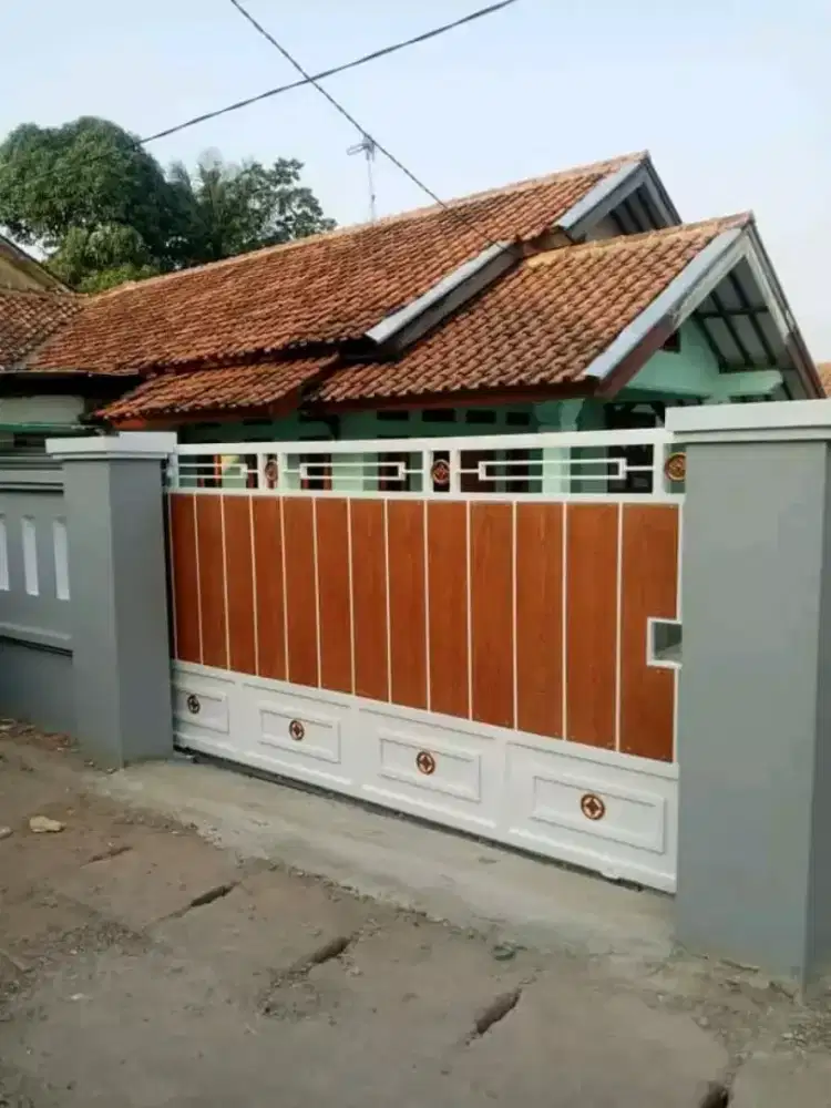 Pagar motif plat besi kombinasi grc