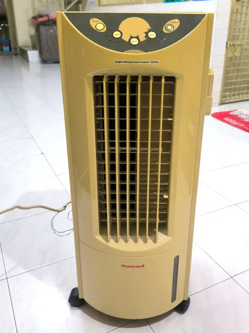 Pending in udara HONEYWELL evaporated Air cooler  kipas angin