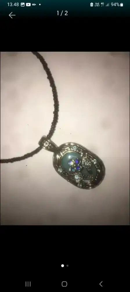 Liontin batu biru muda