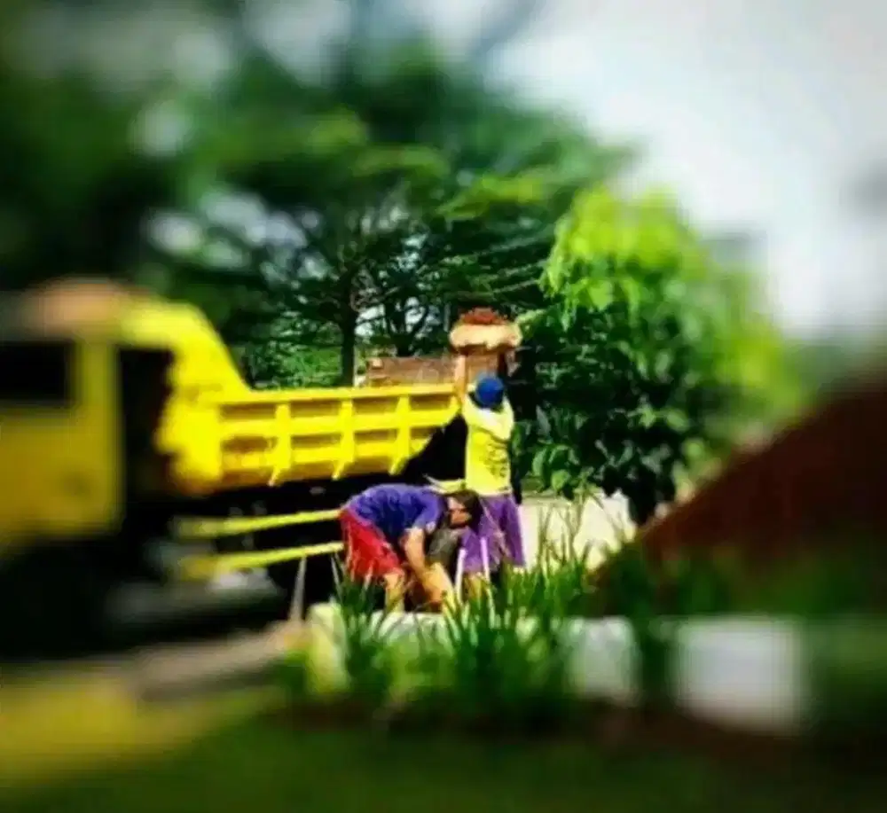 Tanah urug buang puing bangunan