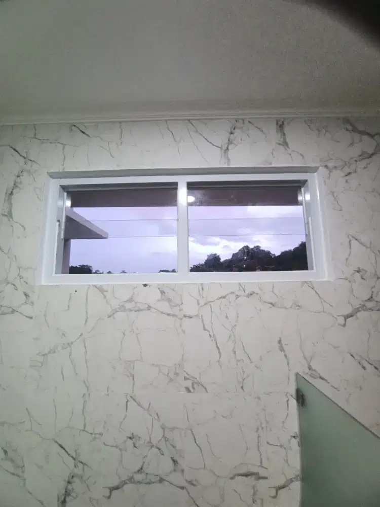 memasang kusen pintu jendela alumunium