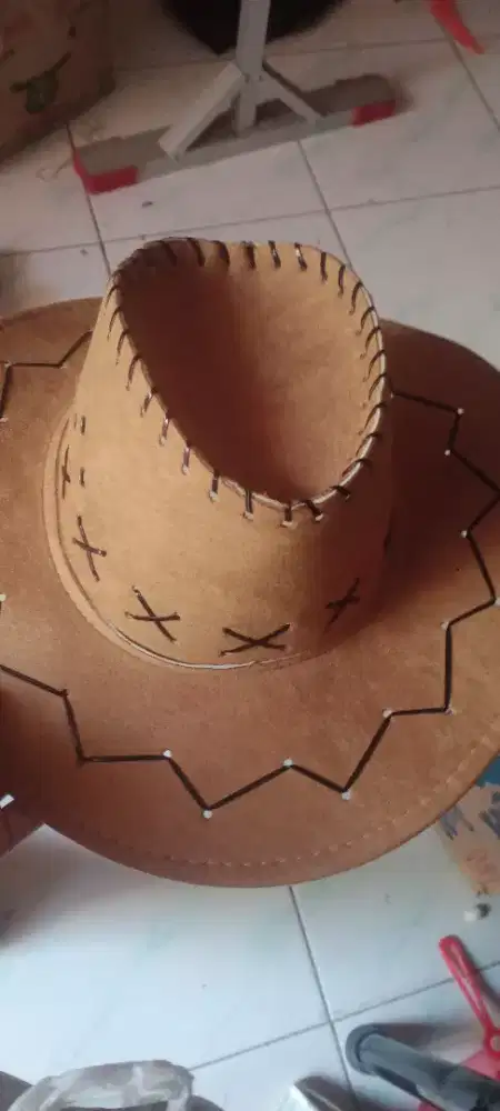 Topi Koboy anak baru