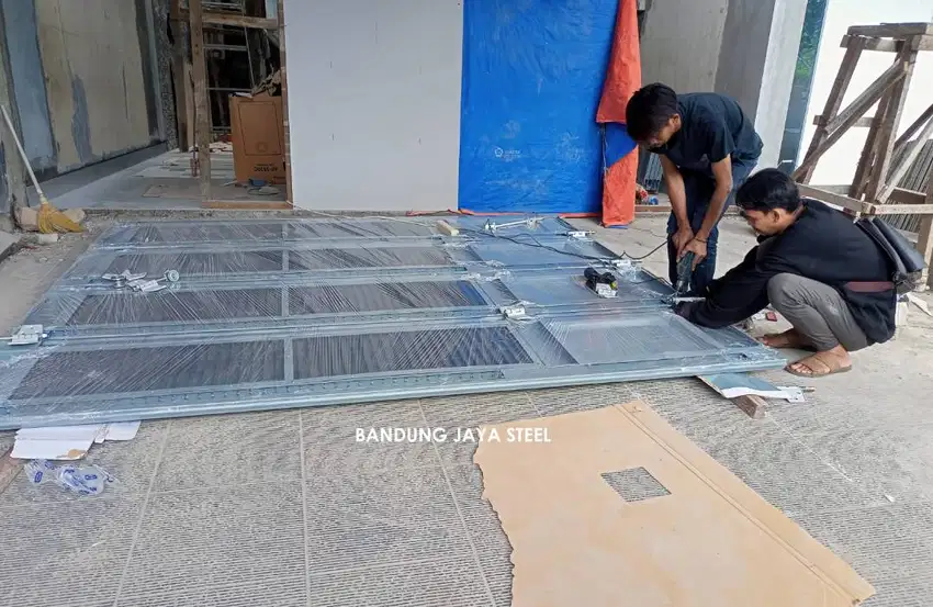 Tukang service pintu garasi henderson di bandung, bergaransi