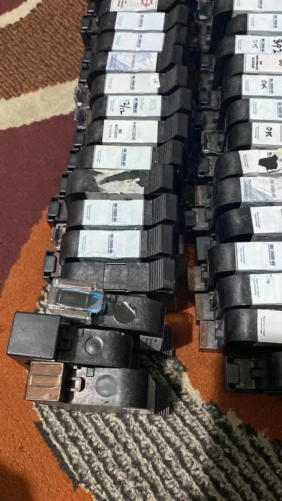 Nenampung tinta printer baru dan bekas