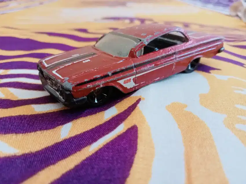 Hot wheels impala 61 red