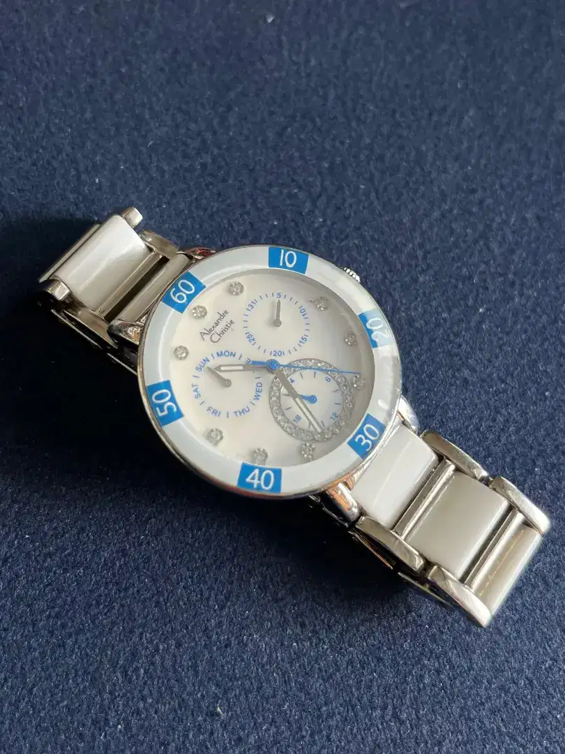 Jam tangan Cewek putih biru merek Alexande Christie