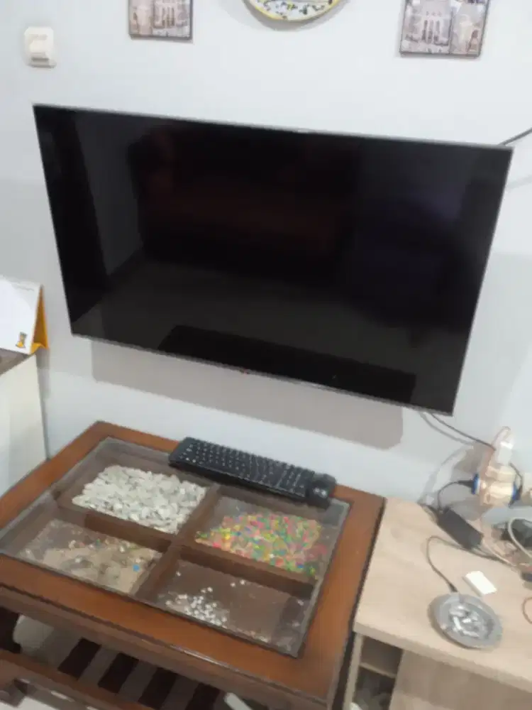 bracket TV plus pasang