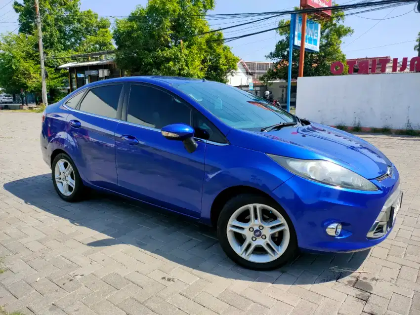 DP 15jt / Fiesta S sport sedan matic  2012