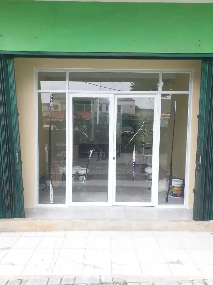 Tukang kaca alumunium