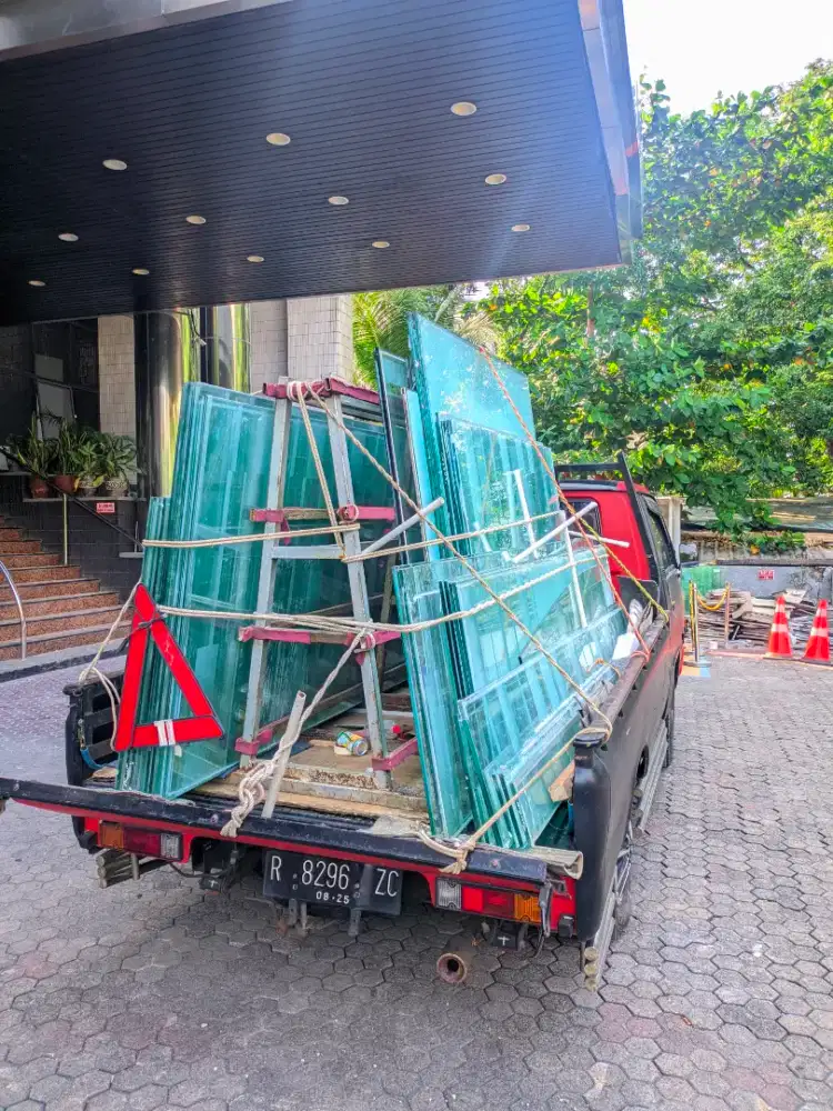 Kaca tempered bekas