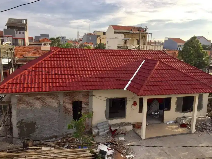 MELAYANI RENOVASI ATAP LAMA GANTI BAJA RINGAN SNI