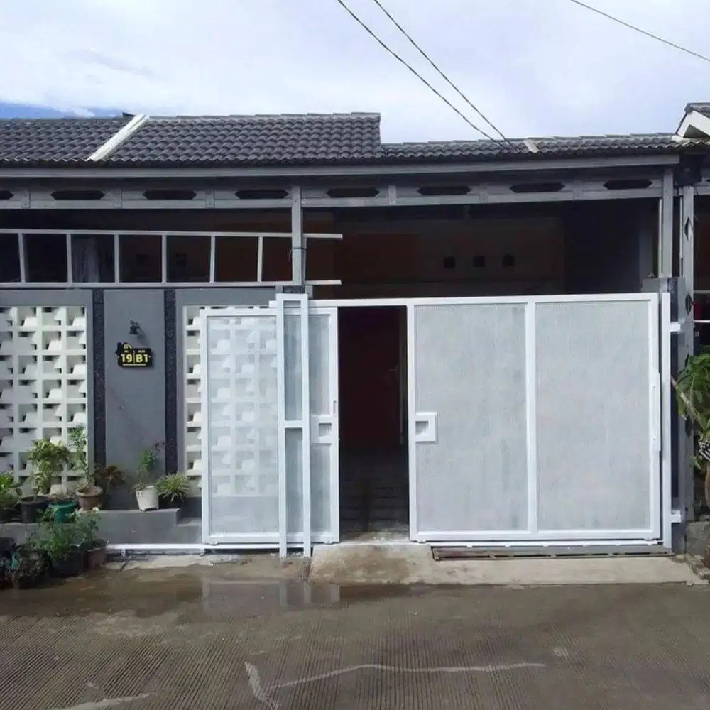 pager rumah plat lubang