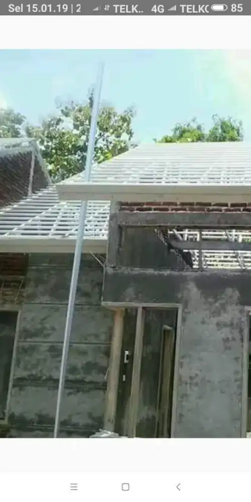 Ahli tukang pasang baja ringan