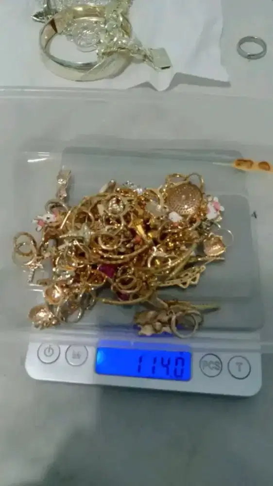 Terima jual beli emas dan berlian Tampa surat bisa cod