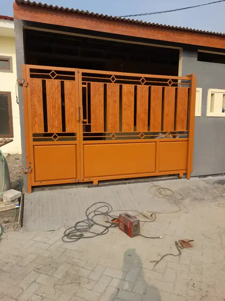 PINTU PAGAR BESI DEKORASI RUMAH