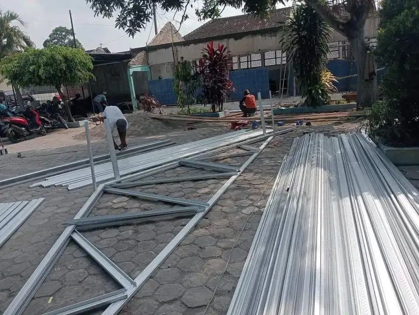 RENOVASI ATAP LAMA KE BAJA RINGAN MURAH BERGARANSI