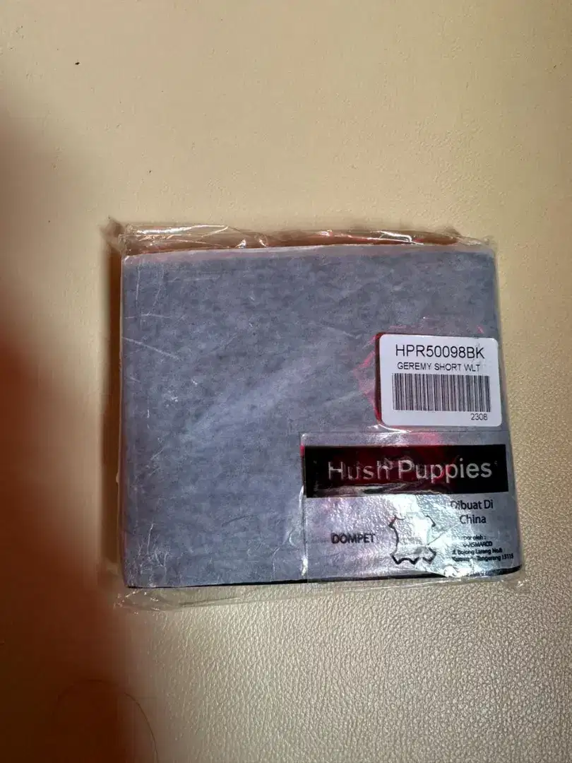 Dompet hush puppies