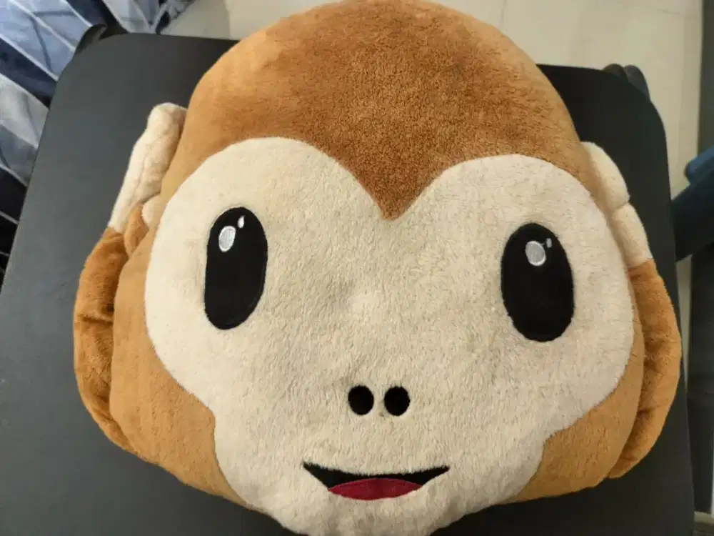 Boneka kepala monyet lucu