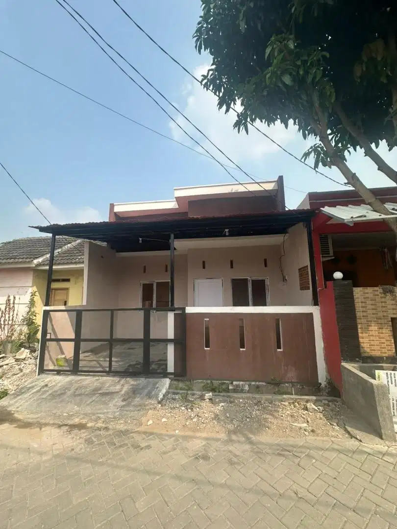 Dijual rumah coklat perumahan taman adiyasa