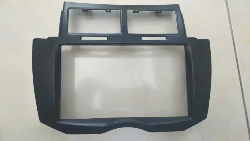 Cover head unit/ac yaris bakpao