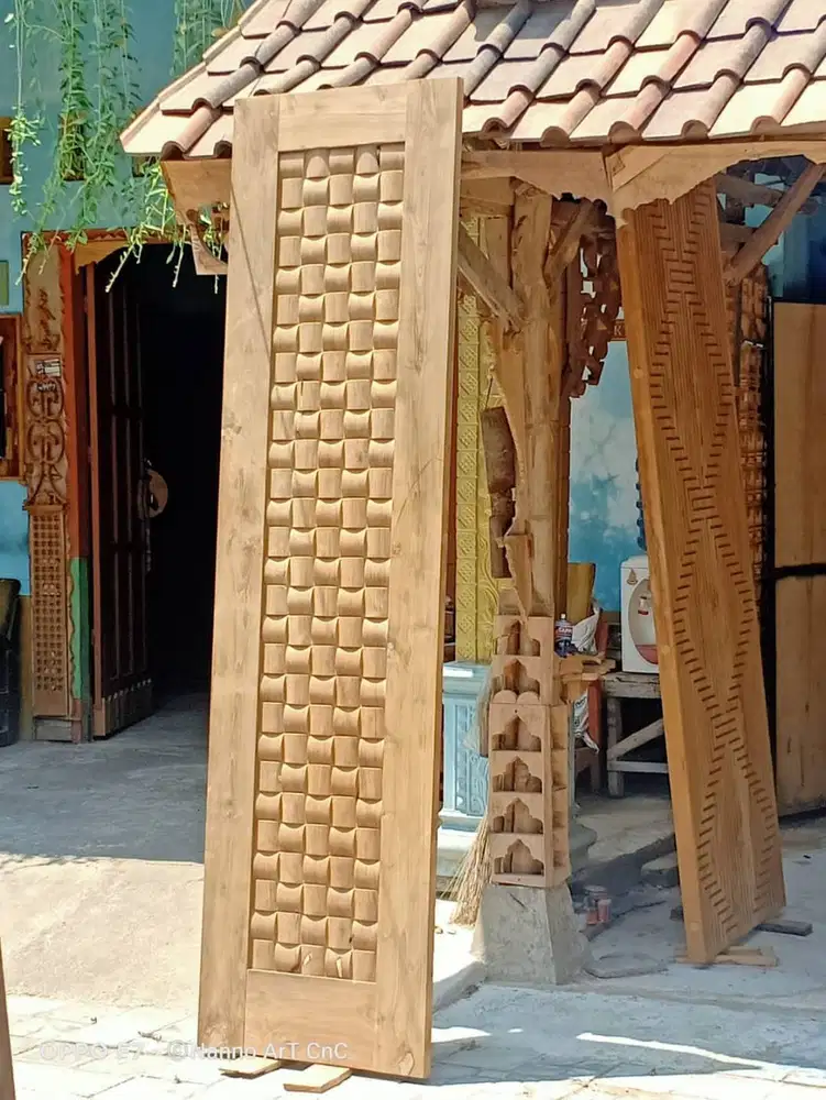 Pintu rumah kayu jati model unik