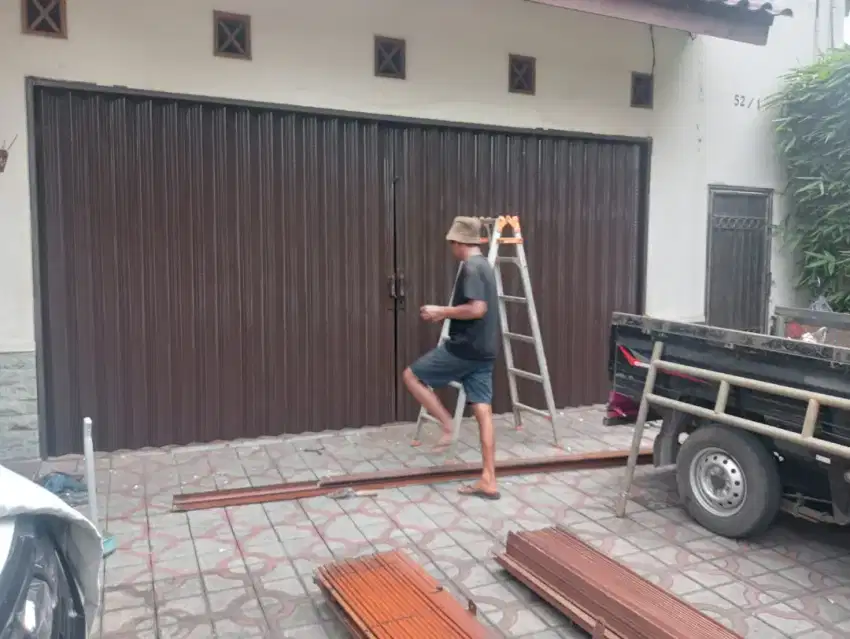 Folding gate rolling door