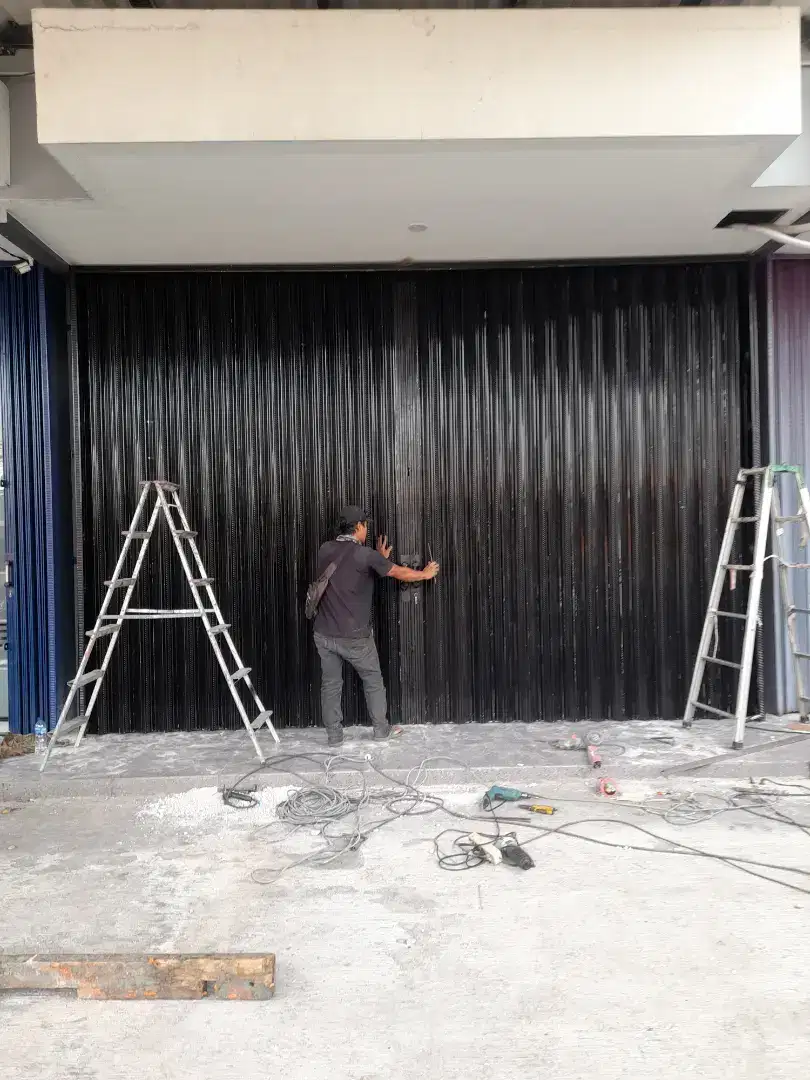 Folding gate rolling door