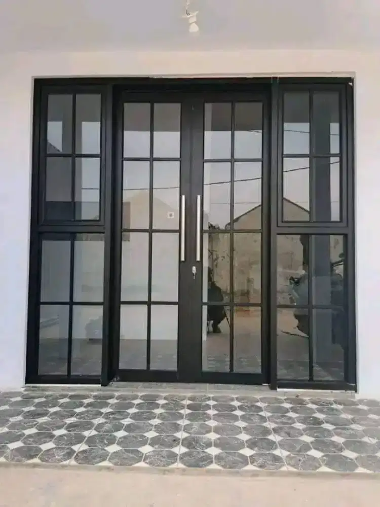 Tukang aluminium dan kaca