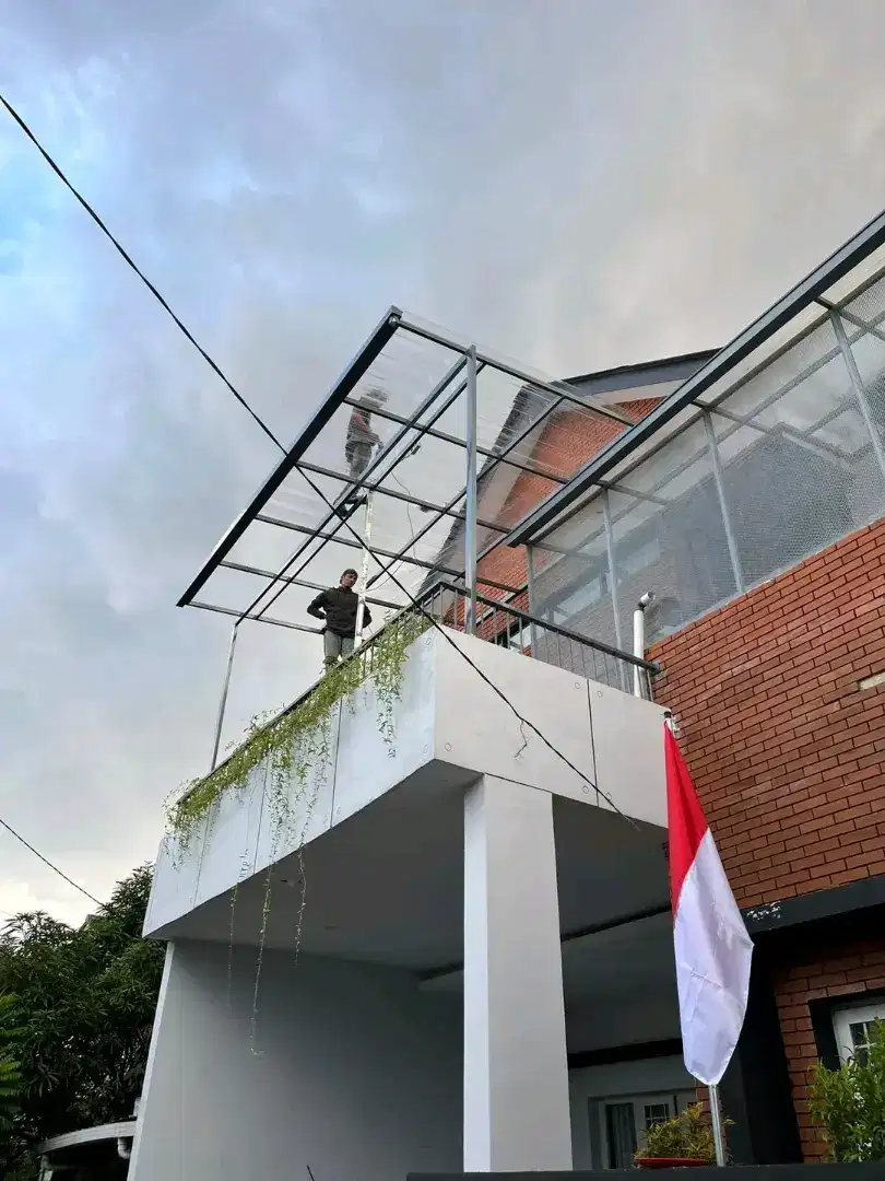 kanopi rangka besi hollow 40x60 atap spandek transparan