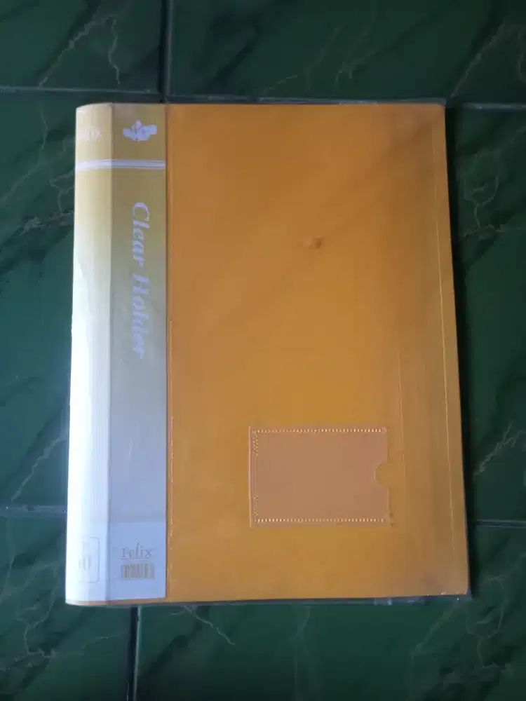 1 BUAH CLEAR HOLDER BARU F4 
ISI 60 POCKET MERK FELIX
