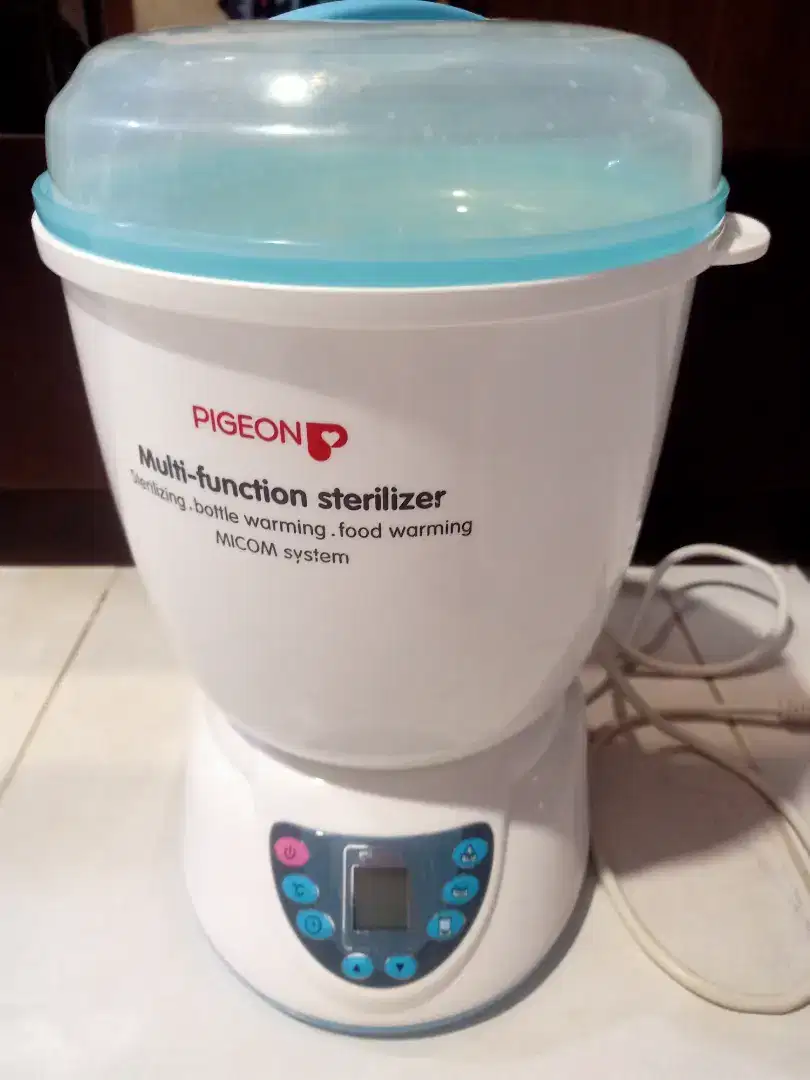 Pigeon sterilizing bottle warming. Multi function