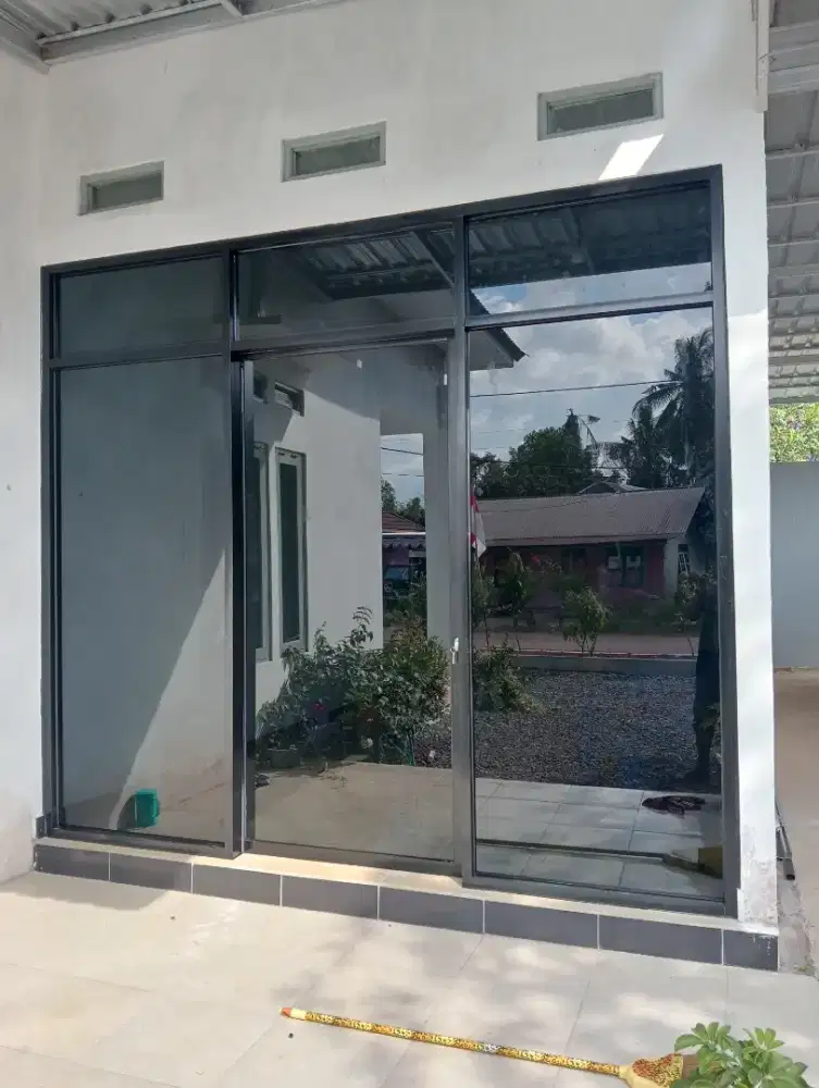 Pintu geser tau dorong almanium