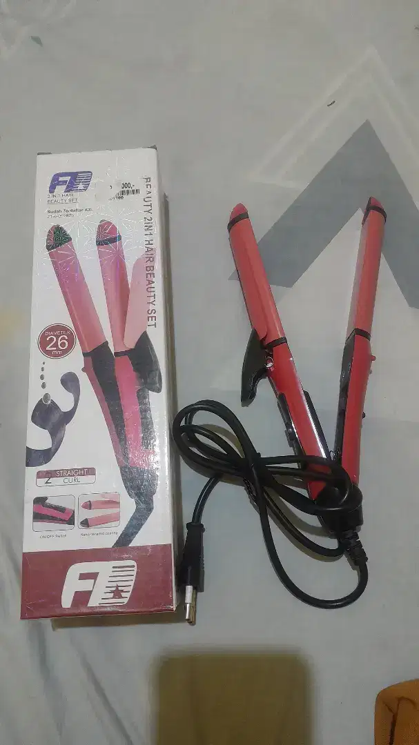 Catok rambut untuk keriting dan lurus