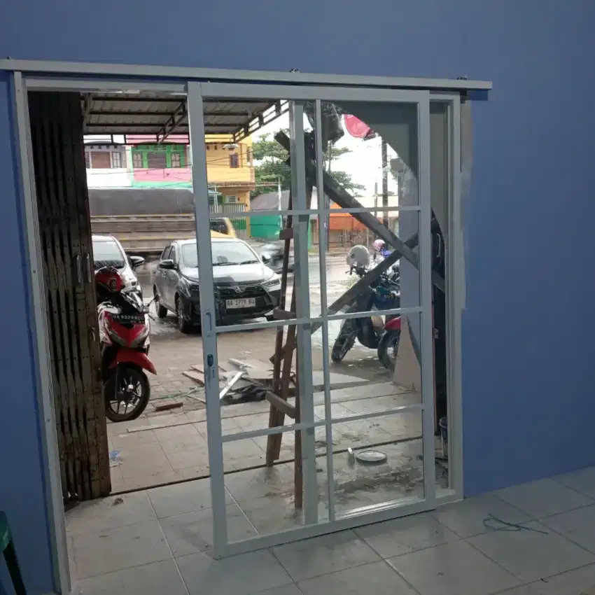 Pintu geser almanium