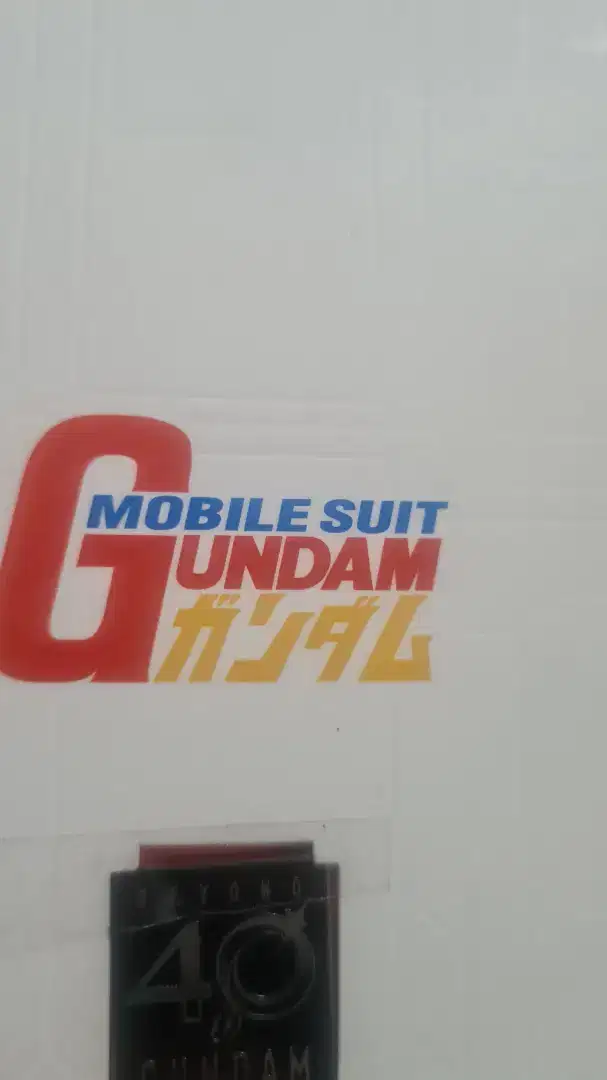 Mainan koin gundam anniversary, motogp