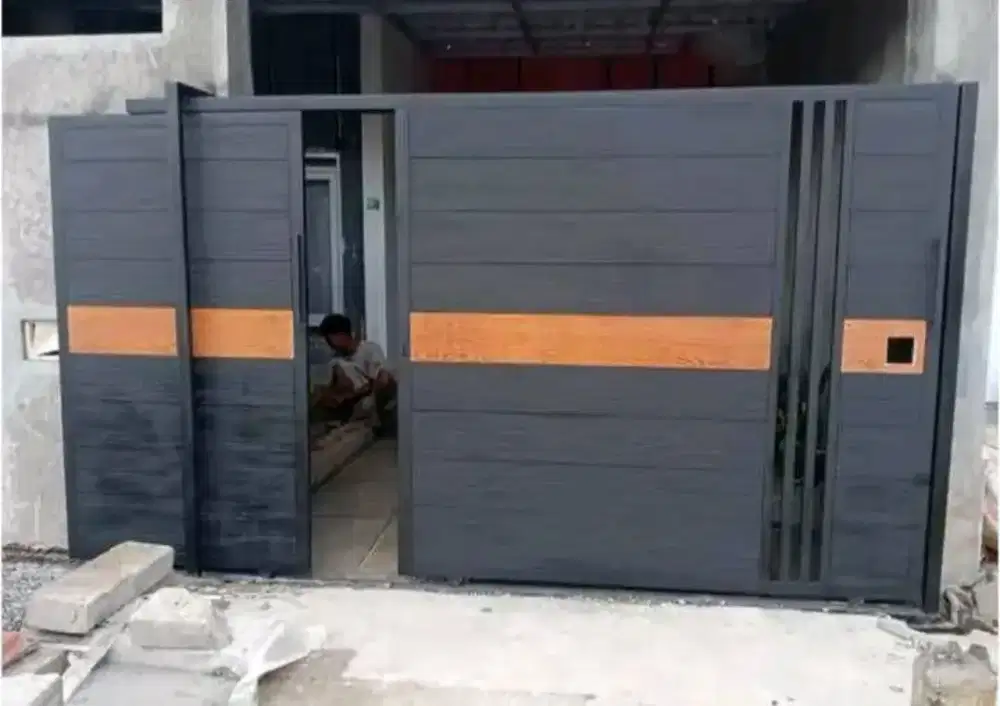 Pagar rumah motip grc