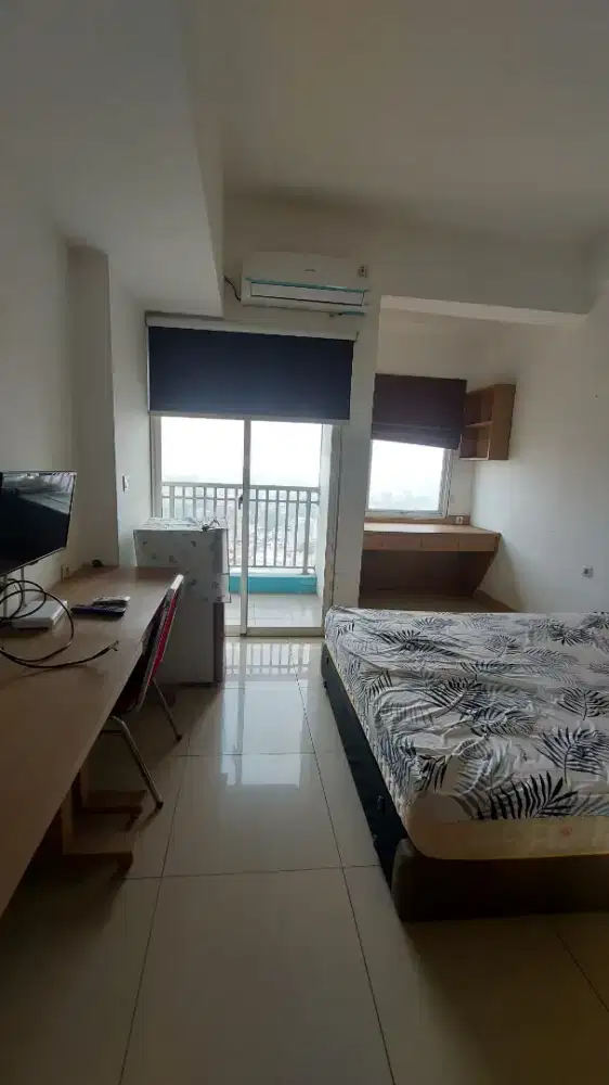 Disewakan studio semi furnish apartement the nest