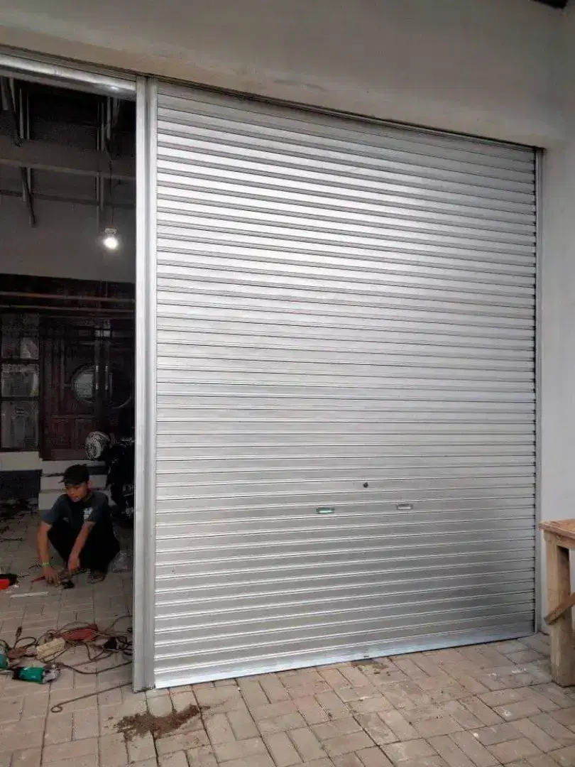 Roling door folding gate