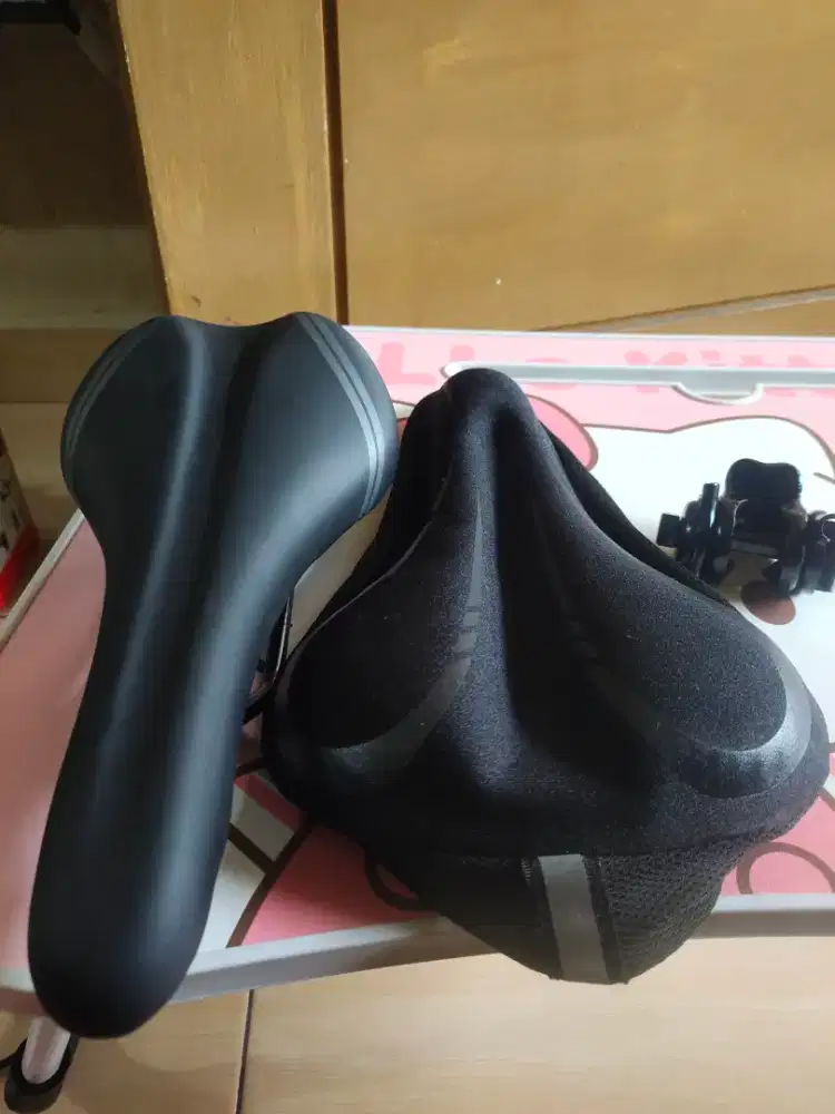 Sadel jok dan sarung jok sepeda