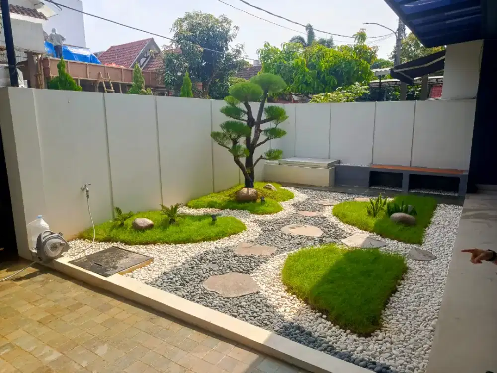 Pemasangan batu taman