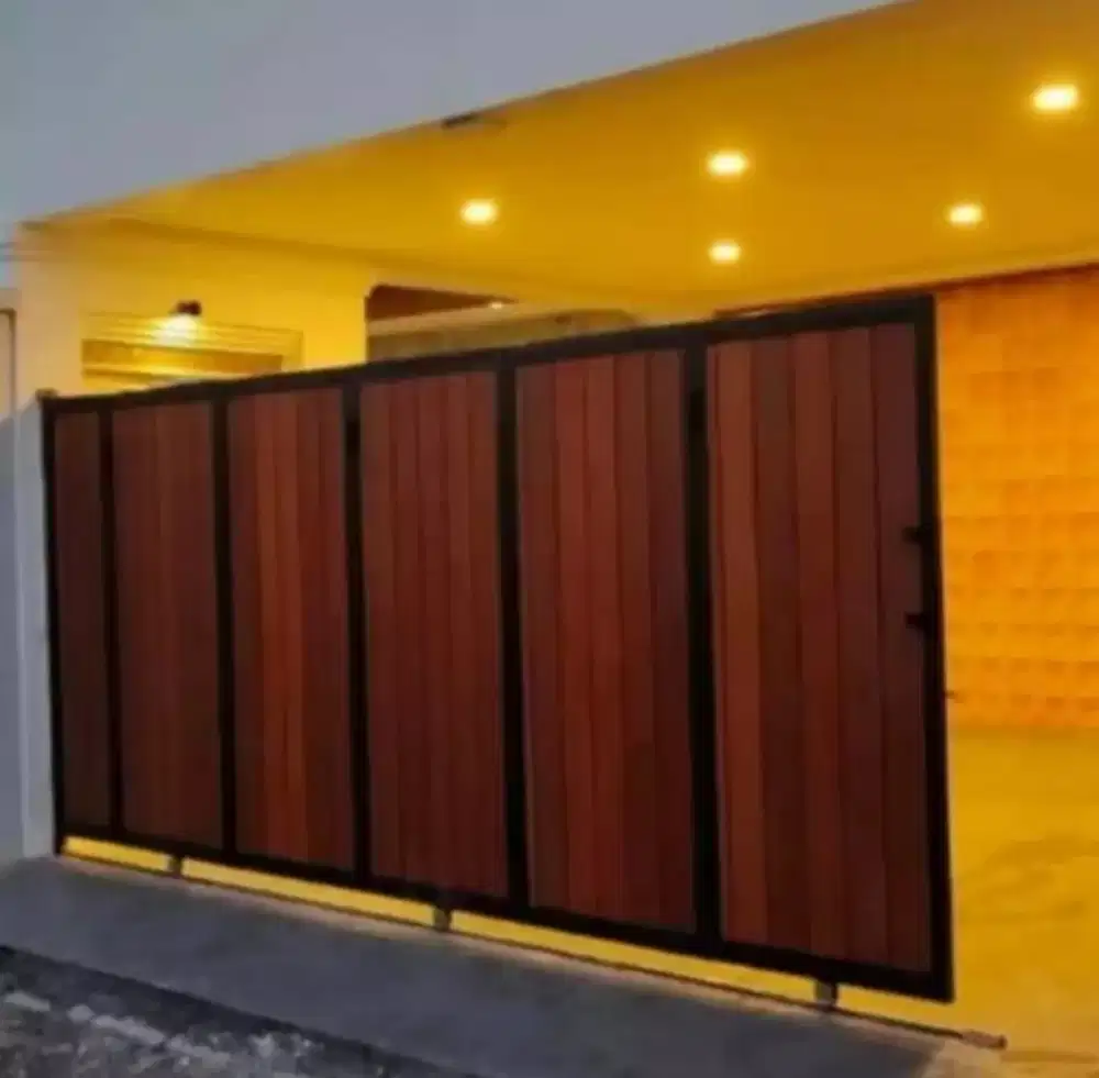 Pagar lipat rumah