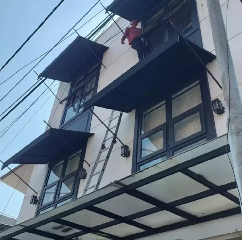 Kanopi kain moderen tampiasn air