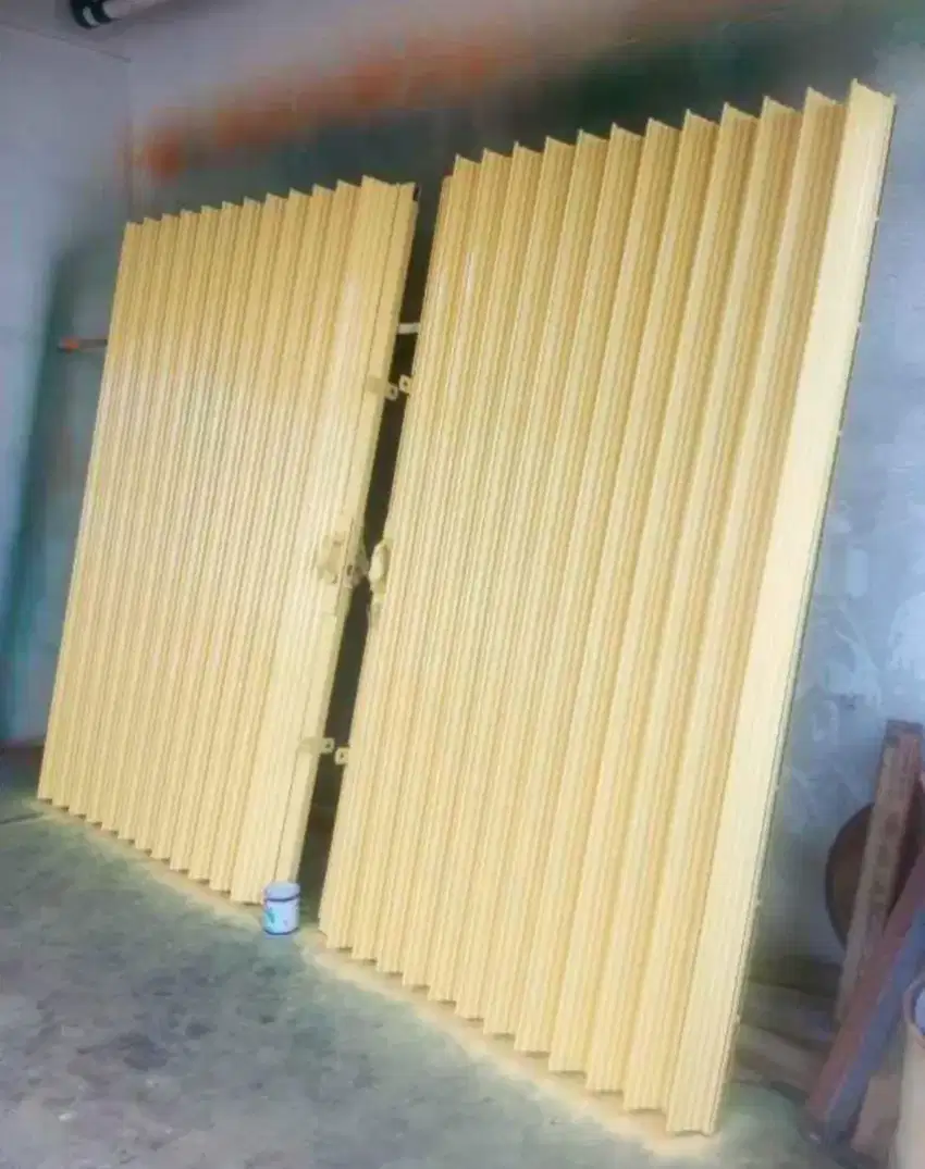 Folding gate rolling door