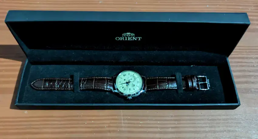 Orient bambino sun & moon