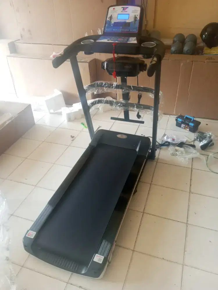 Treadmill elektrik multifungsi bergaransi