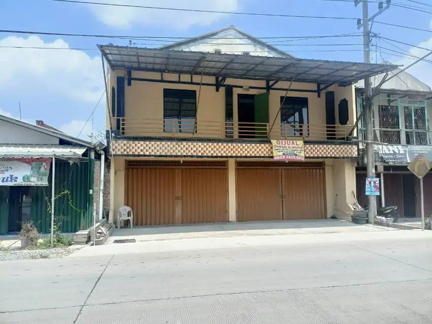 JUAL 2 RUKO DEPAN PASAR MERAPI