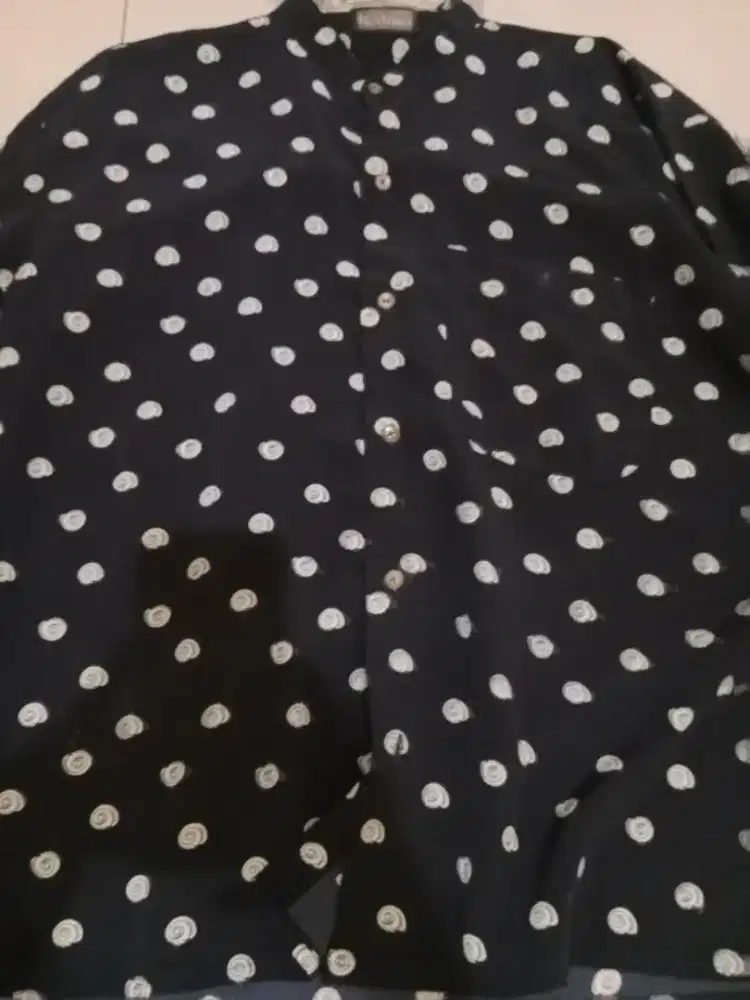 Baju warna biru motif